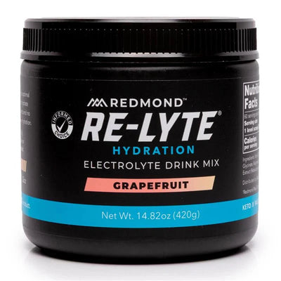Re-Lyte Hydration - Grapefruit - Tub - 60 Serves electrolyte drink mix by Re-Lyte in black container with blue label.