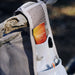 Sodii Raw Electrolyte Honey sachet in a running vest pocket