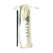 LYTES black stainless steel straw beside a wire cleaning brush and a canvas drawstring pouch printed with the LYTES logo