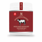 A white plastic tub of Nxsen Premium Beef Goulash with a deep red label featuring a black and white cow illustration and text reading 'Grass-Fed & Finished Freeze-Dried Ground Beef'.