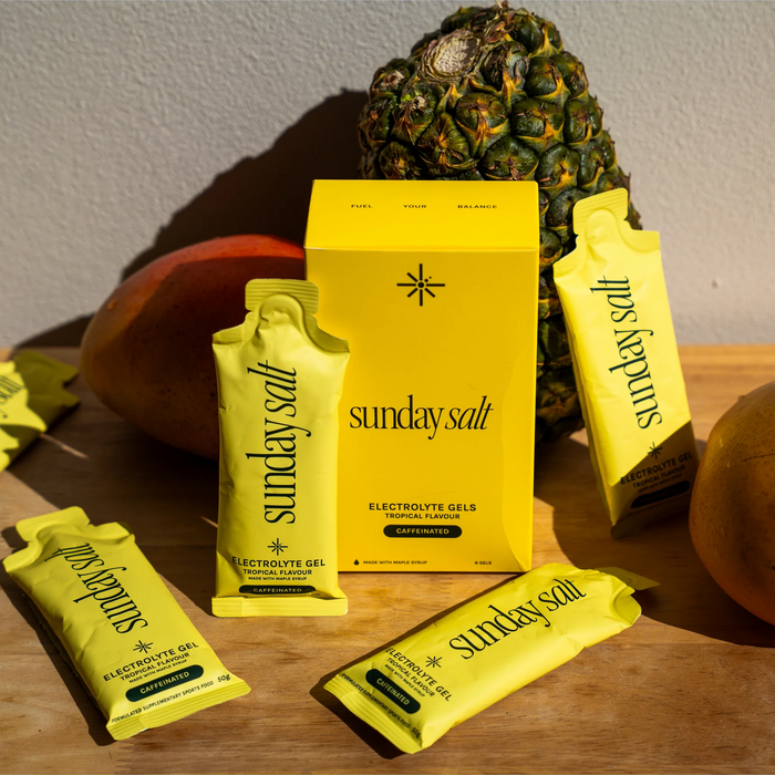 Sunday Salt Tropical – Caffeinated Energy Gel - 6 Sachets with pineapple and mango background, part of Drinks and Electrolytes collections.