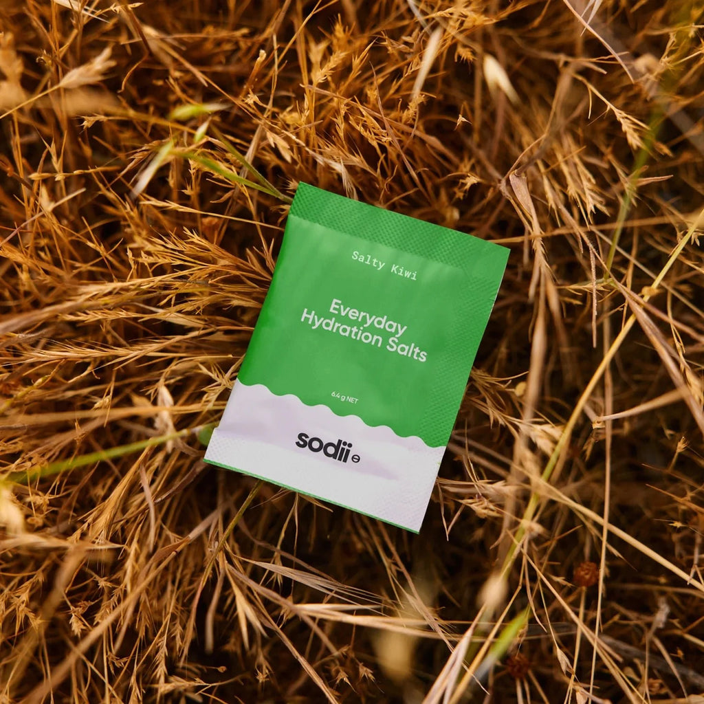 Salty Kiwi - 30 Sachets by Sodii, hydration salts packet on dry grass, part of Electrolytes and Low Carb collections