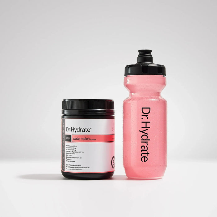 Dr. Hydrate Watermelon Jar - 30 Serves powder container beside pink branded drink bottle on white background.